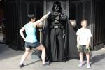 The wife and the kiddo battle Vader.